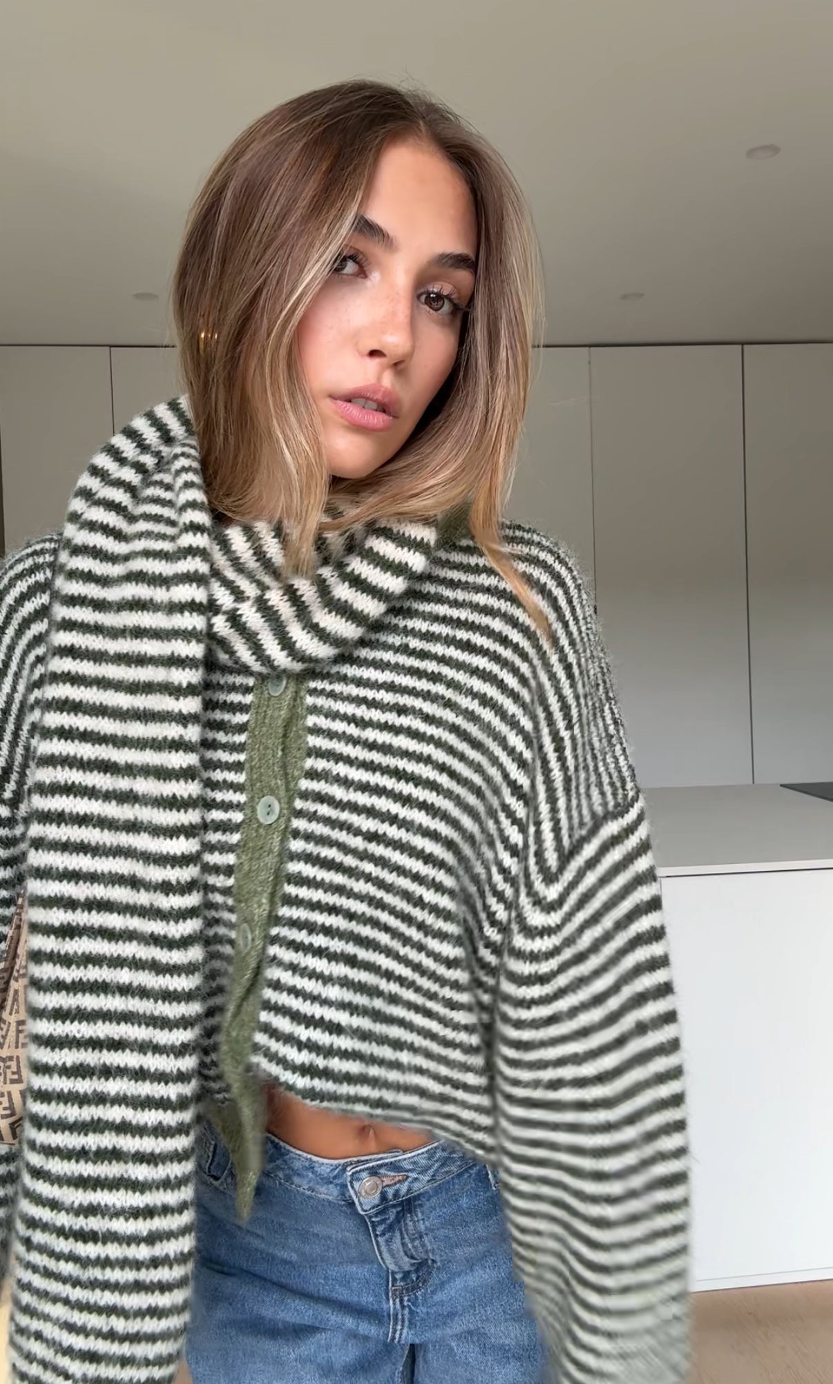 Soft striped cardigan in a muted color