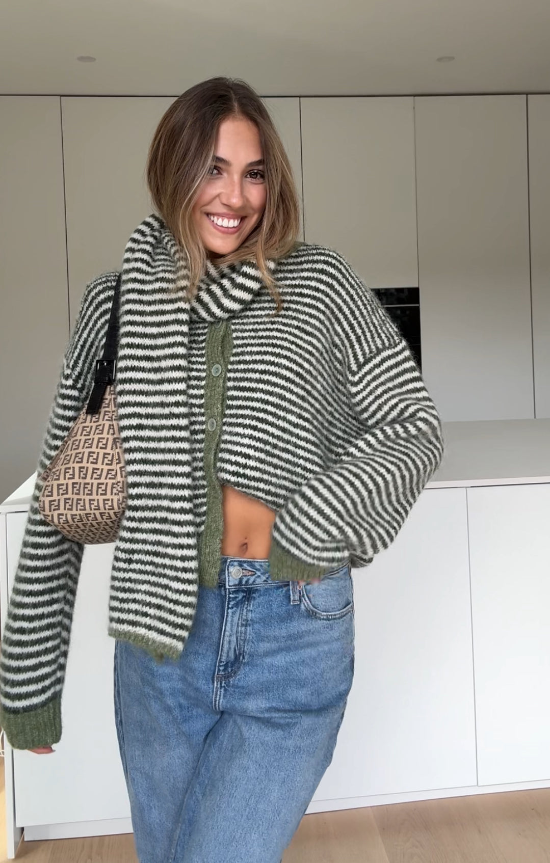 Soft striped cardigan in a muted color