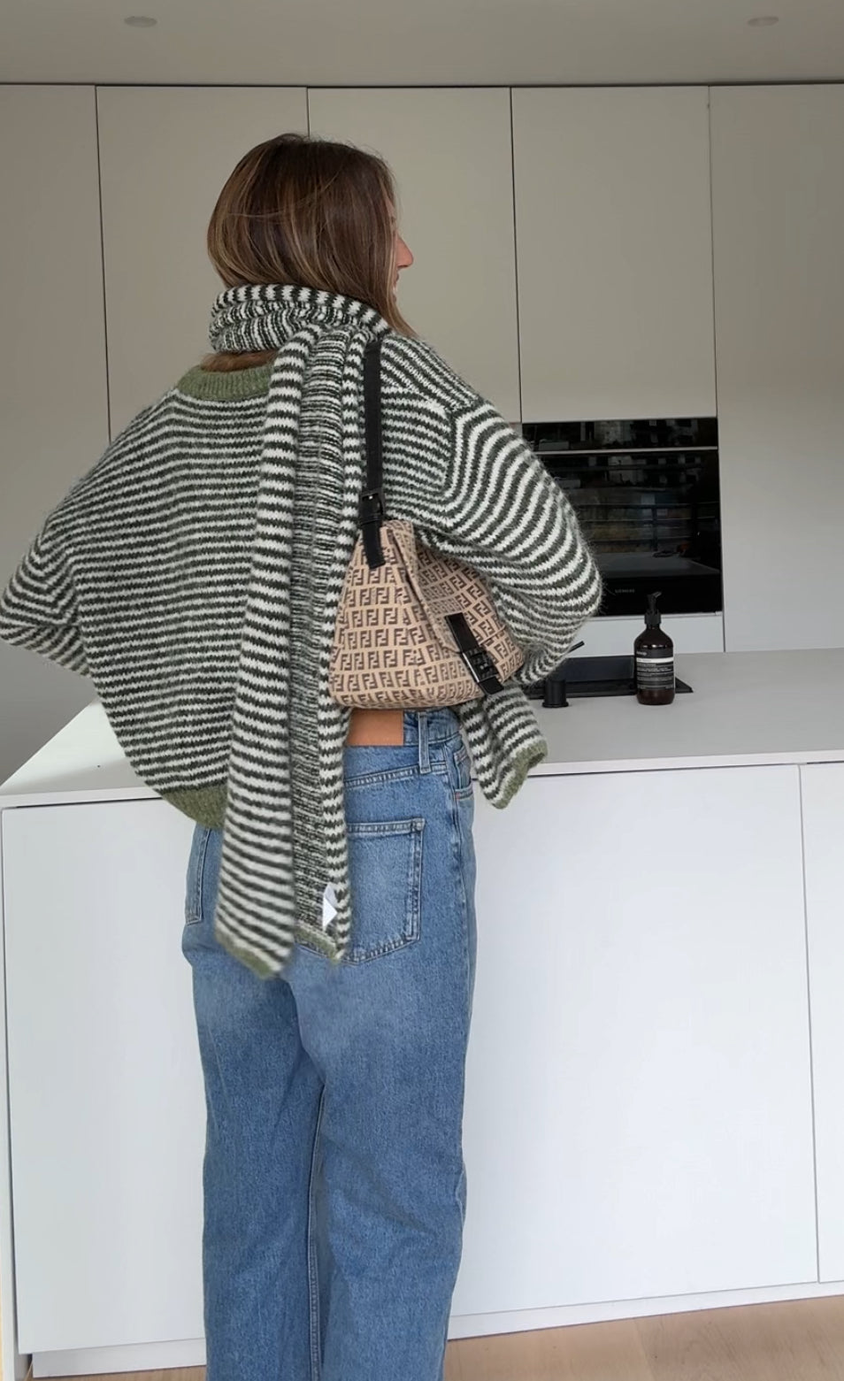 Soft striped cardigan in a muted color