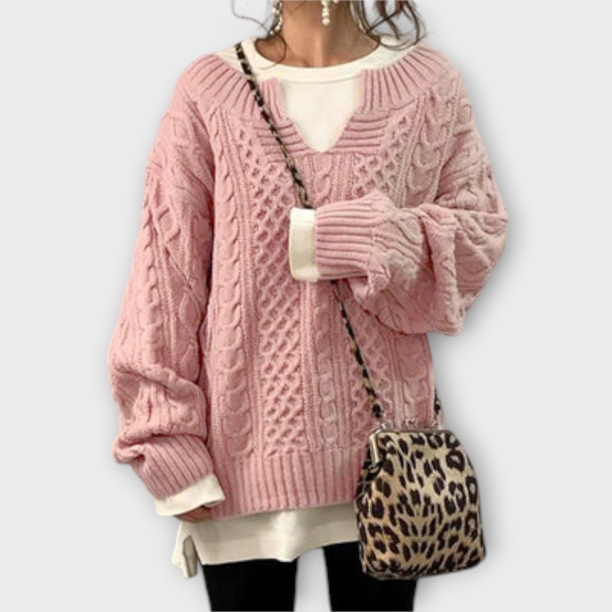 Extra large knitted sweater with braid pattern