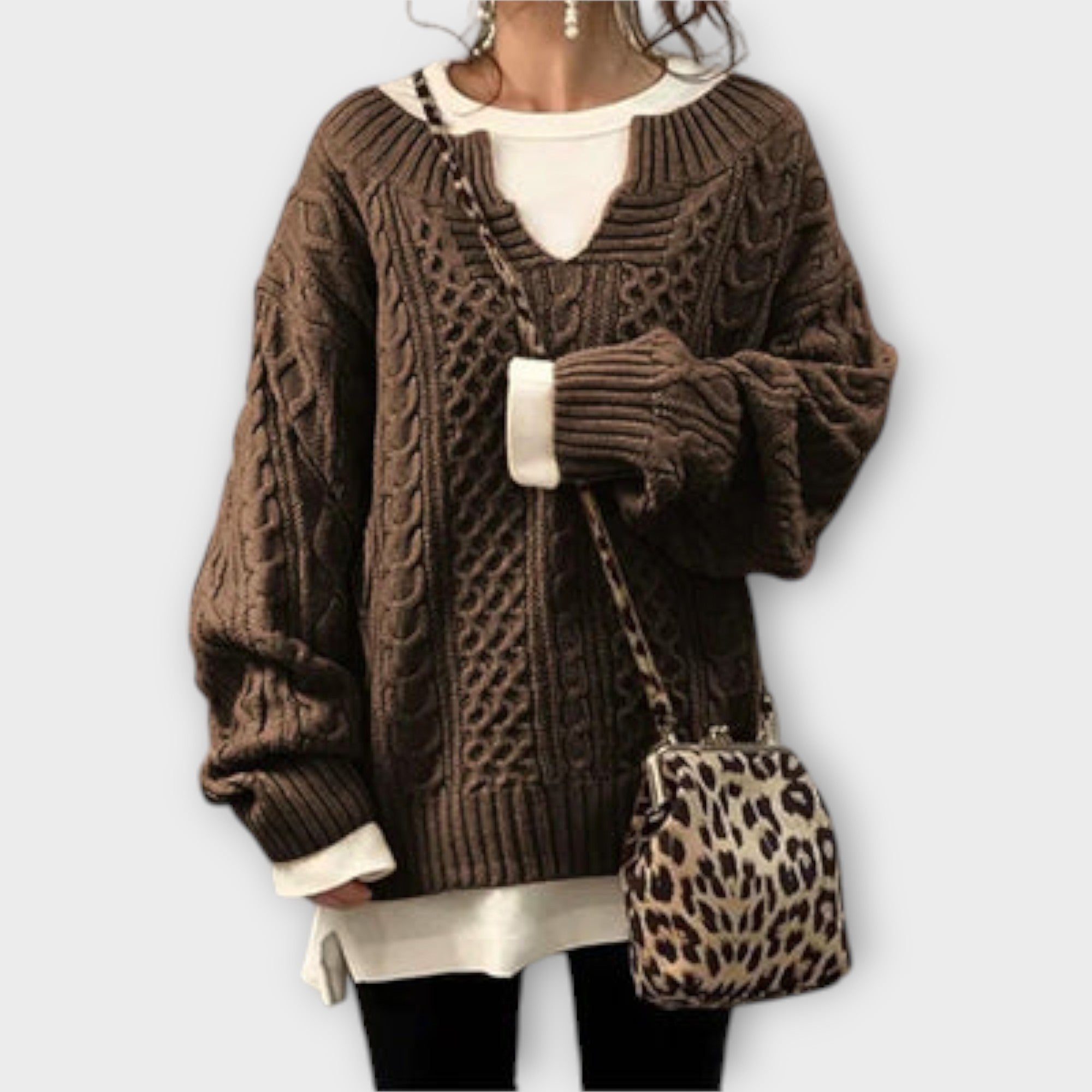 Extra large knitted sweater with braid pattern